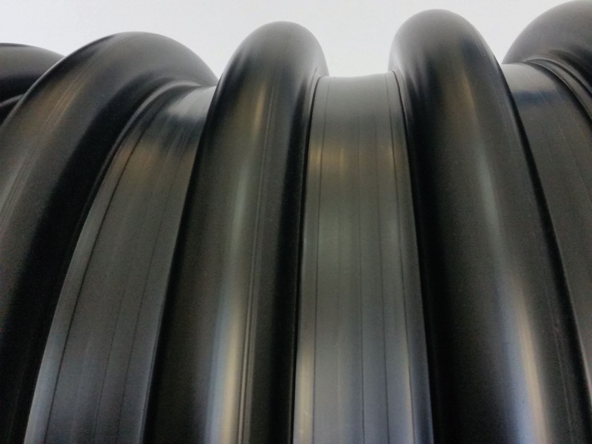 Profiled pressure pipe, spiral wound acc. to DIN 16961, produced on a Krah machine at UGPM, Sultanate Oman