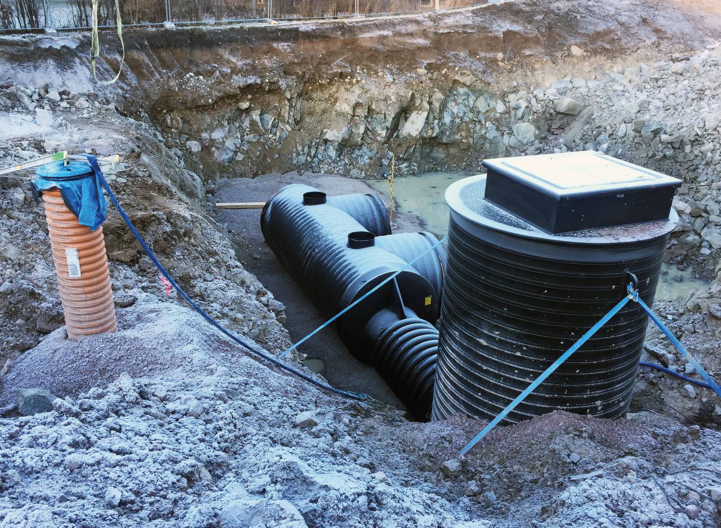 Sewage collection tank during installation